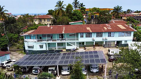 This photo released by Easy Solar shows a large solar panels installation on a rooftop of an office building in Freetown, Sierra Leone, Tuesday Aug. 13, 2024