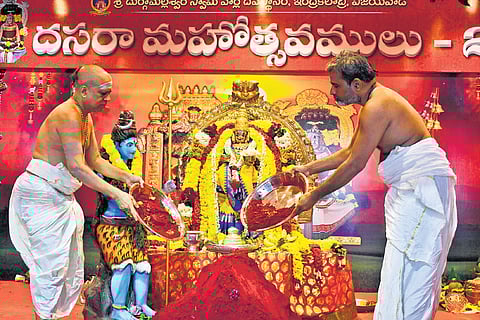 Goddess Kanaka Durga appeared as Annapurna Devi on the third day of Dasara festivities atop Indrakeladri in Vijayawada on Saturday