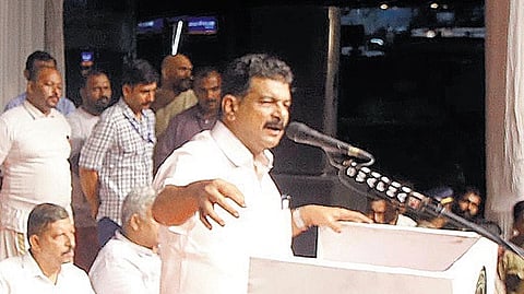Nilambur MLA P V Anvar addressing a public meeting in Manjeri on Sunday.