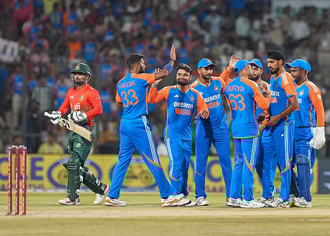 Arshdeep Singh celebrates with teammates after taking the wicket of Bangladesh's Litton Das during the first T20 International cricket match between India and Bangladesh at Shrimant Madhavrao Scindia Cricket Stadium, in Gwalior, Sunday, Oct. 6, 2024.