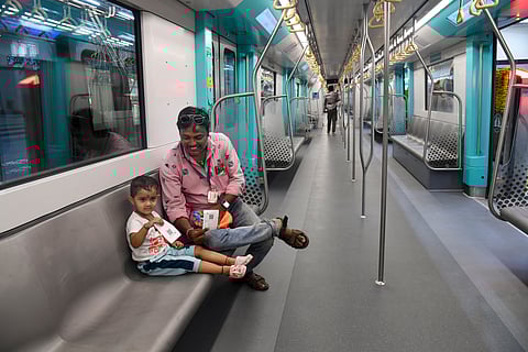 People ride a metro on the Bandra Kurla Complex (BKC) to Aarey underground section of Mumbai Metro Line 3 after it was opened for public, in Mumbai, Monday, Oct. 7, 2024.