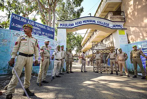 Security personnel stand guard outside a counting centre, a day before the counting of votes for Jammu & Kashmir Assembly elections, in Jammu, Monday, Oct. 7, 2024.