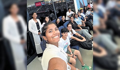 UAE players watching India-Pakistan match from the stands.