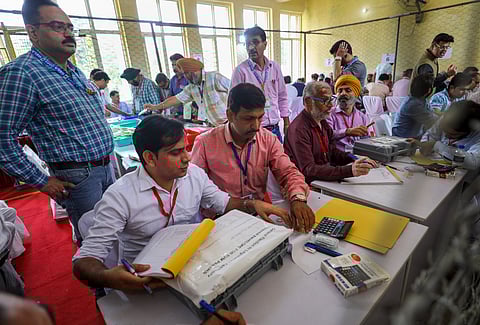 Counting of votes underway at the Polytechnic College centre for J&K Assembly polls, in Jammu, Tuesday.
