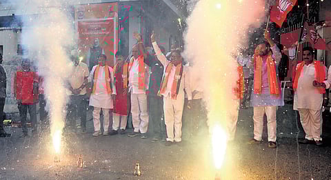 BJP supporters celebrate the party’s victory in the Haryana elections, at the party office at Nampally in Hyderabad on Tuesday.