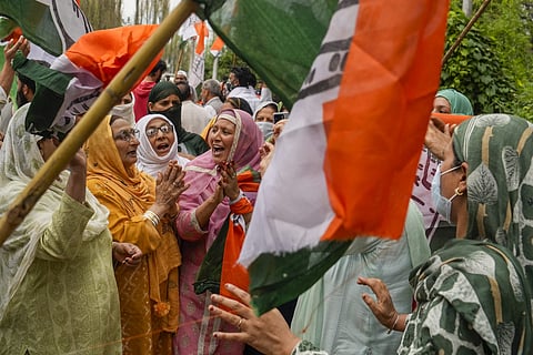 Supporters of Congress and National Conference (NC) celebrate as the Congress-NC alliance leads during the counting of votes of Jammu & Kashmir Assembly elections, in Srinagar, Tuesday, Oct. 8, 2024.