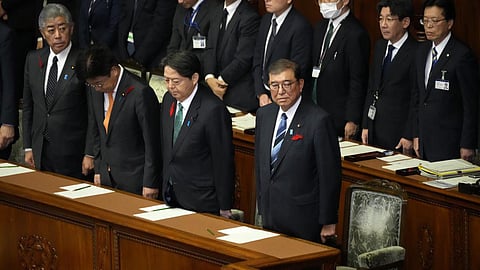 Japanese Prime Minister Shigeru Ishiba, right, attends an extraordinary Diet session at the lower house of parliament Wednesday, Oct. 9, 2024, in Tokyo.
