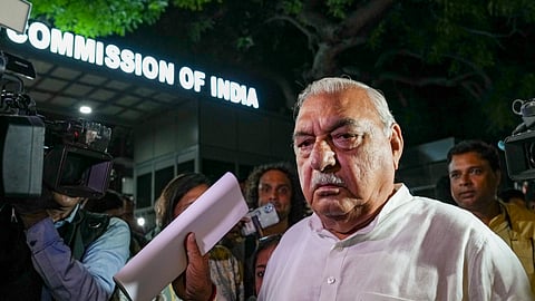 Congress leader Bhupinder Singh Hooda speaks with the media after meeting Election Commissioners at Nirvachan Sadan, in New Delhi, Wednesday, Oct. 9, 2024.