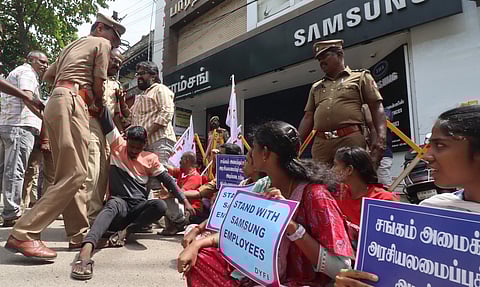 Members of the DYFI stage a protest on Oct 10, 2024, in front of Samsung showroom in Madurai in support of protesting Samsung workers near Chennai.