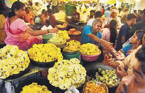 Heavy rush at a flower market in Coimbatore on Thursday