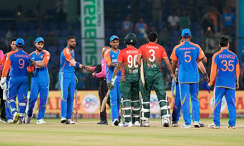 Indian players being congratulated by Bangladesh's Taskin Ahmed and Mustafizur Rahman after winning the second T20 International cricket match between India and Bangladesh on Oct. 9, 2024.