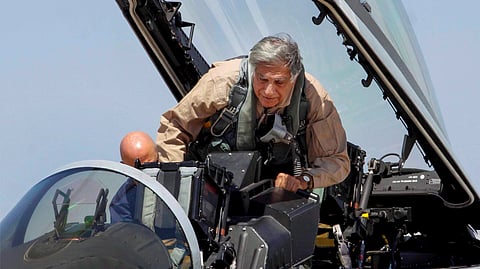 Ratan Tata sits in the cockpit of a F17 fighter plane during the Aero India 2011, India's biggest air show, at Yelahanka Air base in Bangalore.