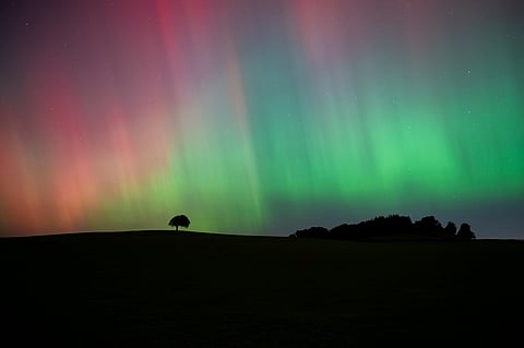 The Northern Lights, also known as the Aurora Borealis, are seen in the sky near Knaresborough, England, Friday, Oct. 11, 2024.