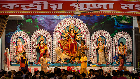 A tableau depicting the slaying of demon Mahishasura by the Hindu goddess Durga, center, is installed with other gods at Dhakeshwari National Temple during the Durgapuja festival in Dhaka, Bangladesh, on Oct. 10, 2024.