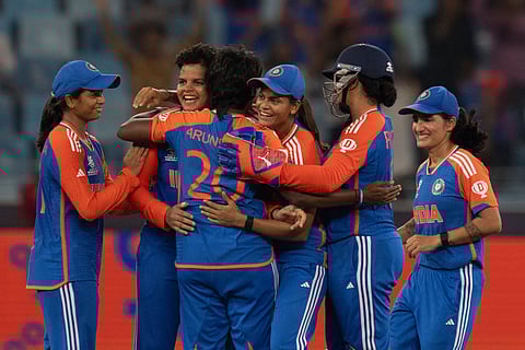 Indian players celebrates the wicket of Sri Lanka's Nilakshika Silva during the ICC Women's T20 World Cup 2024 match between India and Sri Lanka at Dubai International Stadium, United Arab Emirates,