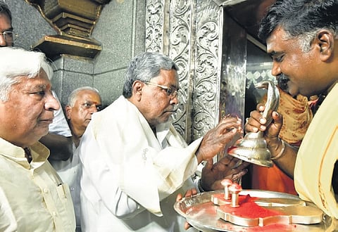 Chief Minister Siddaramaiah prays at Sri Renuka Yellamma Kshetra, Yellamma Gudda, Savadatti, accompanied by Law Minister HK Patil, in Belagavi on Sunday