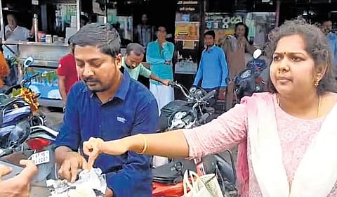 Customers display the ‘centipede’ idli