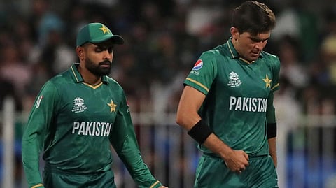 Pakistan's Shaheen Afridi (R) with captain Babar Azam.