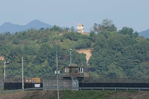 FILE - A North Korean military guard post, top, and a South Korean post, bottom, are seen from Paju, South Korea, near the border with North Korea, Thursday, Oct. 10, 2024.