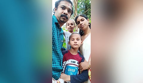 Renjith, his wife Reshmi, son Adhi, and daughter Adhya.