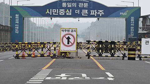 Barricades are seen at a military checkpoint on the Tongil bridge, the road leading to North Korea's Kaesong city, in the border city of Paju on October 15, 2024.