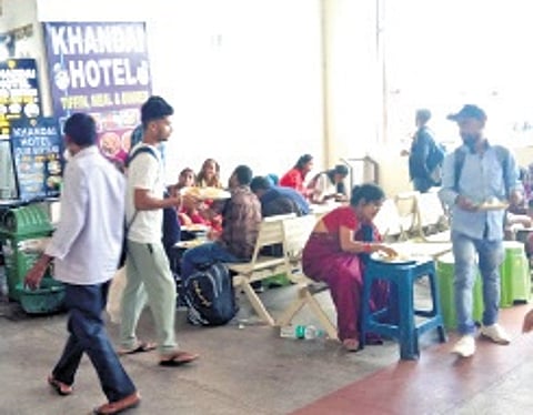 Passengers having meals at the waiting room of CNBT.