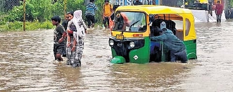 The Hennur Bande-Horamavu Road was flooded following incessant rainfall throughout on Tuesday in Bengaluru