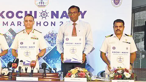 (From L): Captain T Ranjith Sundaram (Sports Officer, SNC), Commodore Sandeep D Sabnis (race organiser), Rear Admiral Upal Kundu (Chief of Staff, Southern Naval Command), Commander Atul Pillai (PRO Defence) and Commander Prince Mathai (race director) during the curtain-raiser event at Kochi Naval Base on Thursday