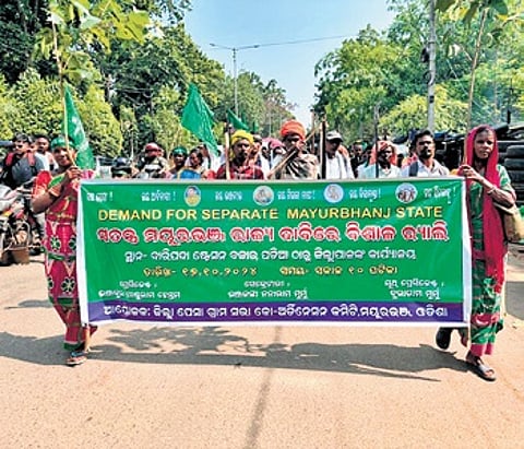 The protesters, under the aegis of the District PESA Gram Sabha Coordination Committee, went across the town wearing tribal attires and staged a dharna in front of the Baripada collectorate.