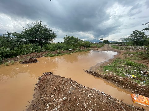 During monsoon, residents of Mullai Nagar at Kavundampalayam are not only left to commute through a bad patch of road but also wade through bad roads in which rainwater stagnates.