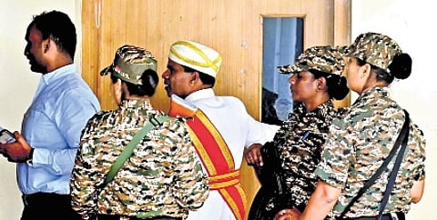 ED officials at the MUDA office in Mysuru on Friday.