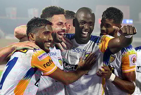 Lukas Pivetta Brambilla (2L) celebrates with teammates after scoring a goal against NorthEast United FC during an Indian Super League (ISL) 2024-25 football match, at the Indira Gandhi Athletic Stadium, in Guwahati, Thursday, Oct. 17, 2024.