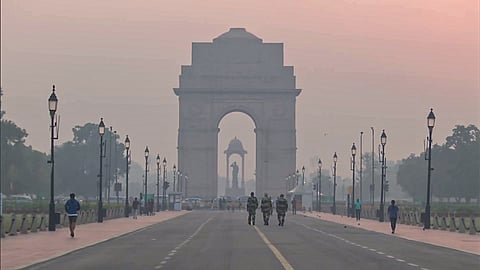 An early morning view of the Kartavya Path covered with smog as the Air Quality Index (AQI) deteriorates in New Delhi on Friday, Oct.18, 2024