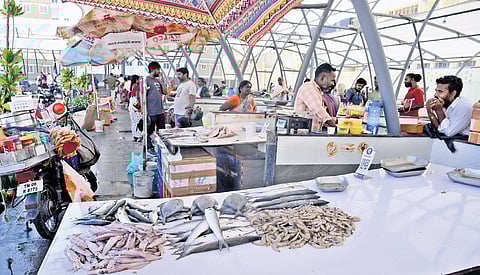 Vendors await customers at the new market in Marina