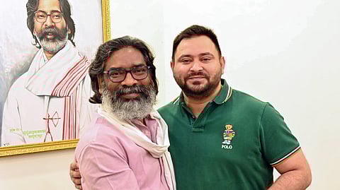 Rashtriya Janta Dal (RJD) leader Tejashwi Prasad Yadav (R) meets Jharkhand Chief Minister Hemant Soren at the latter's residence in Ranchi on Oct. 19, 2024.