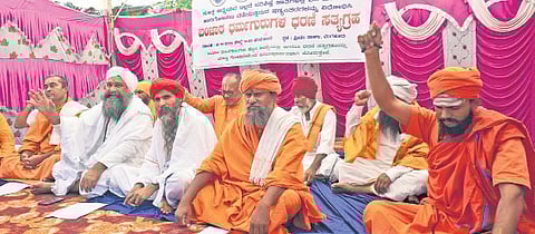 Members of the Banjara community protest against the state government’s decision on classification of SC quota, in Bengaluru on Monday