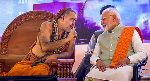 Prime Minister Narendra Modi with Kanchi Kamakoti Shankaracharya Vijayendra Saraswati Swamigal during inauguration of RJ Sankara Eye Hospital, in Varanasi, Sunday, Oct 20, 2024.