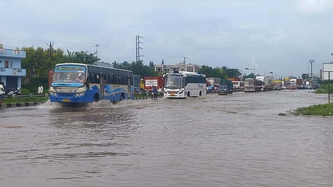 Due to rain and watercourse blockage near National Highway stretch between Krishnagiri to Hosur near Addakurukki water was flooded on road on Monday morning.