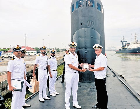 Southern Naval Command Chief Staff Officer (Operations) Commodore Sarvpreet Singh welcomes Russian submarine Commanding Officer Captain Andrey Barkov on arrival at Kochi Naval Base on
Monday
