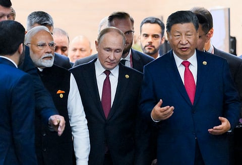 Prime Minister Narendra Modi with Russia's President Vladimir Putin and China's President Xi Jinping during the 16th BRICS Summit, in Kazan, Russia, Wednesday, Oct. 23, 2024.
