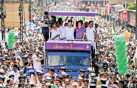 Priyanka and Rahul Gandhi participate in a roadshow at Kalpetta in Wayanad on Wednesday (Right) Priyanka arriving for the roadshow