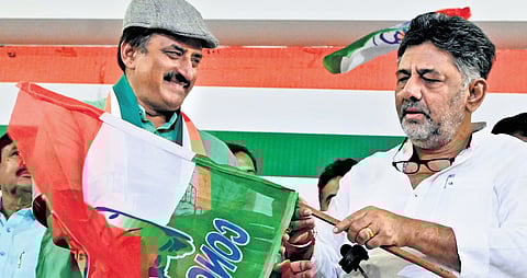 State Congress chief and Deputy Chief Minister DK Shivakumar welcomes former MLC CP Yogeshwara into the Congress, at KPCC office in Bengaluru on Wednesday