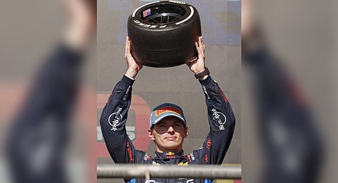 Red Bull driver Max Verstappen, of the Netherlands, holds up his third place trophy after the Formula One U.S. Grand Prix auto race at Circuit of the Americas, Sunday, Oct. 20, 2024, in Austin, Texas.