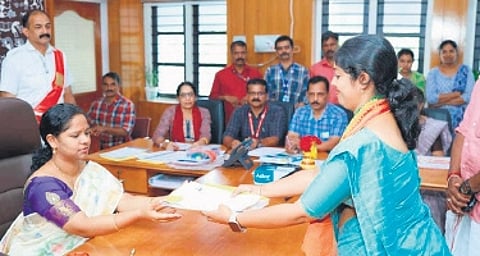 NDA candidate Navya Haridas submitting her nomination papers to Wayanad District Collector Meghasree D R on Thursday