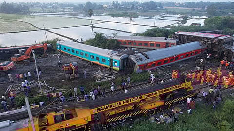 Restoration work at the site where the Mysuru-Darbhanga Bagmati Express train collided with a stationary goods train in Tamil Nadu's Kavaraipettai.