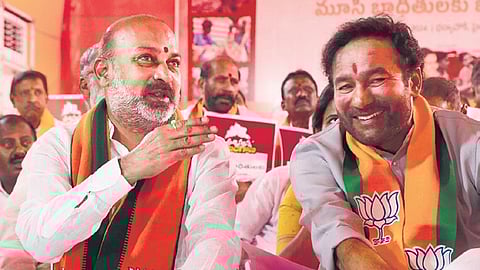 Union Minister G Kishan Reddy along with MoS (Home) Bandi Sanjay during the protest against demolition of homes of the poor for the Musi project, in Hyderabad on Friday