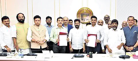 MEIL representatives with Chief Minister A Revanth Reddy and his Cabinet colleagues following the signing of the MOU