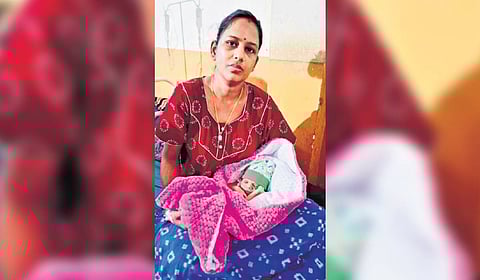 Jharana Mallick with her son Dana.