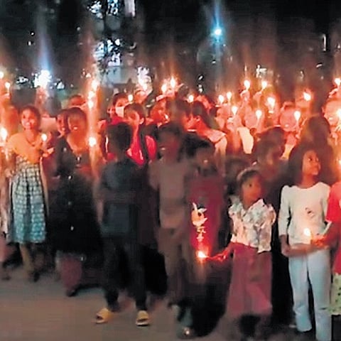 Family members of suspended cops take out a candle rally in Kondapur