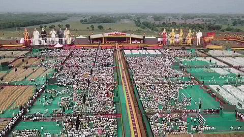 People begin to flock to the first political conference of actor Vijay-led Tamilaga Vettri Kazhagam (TVK) in Vikravandi, Tamil Nadu, on Sunday.